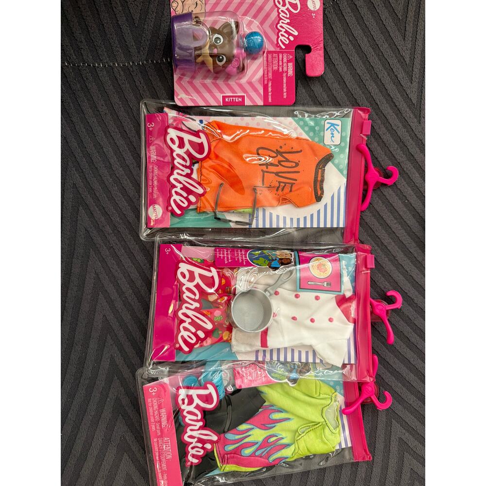 Barbie 4 pack 2 Ken Clothes, 1 Barbie and Pet
